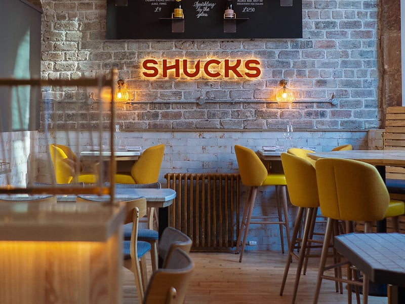 Shucks is located in Glasgow, Strathclyde. The Good Food Guide says: “Shucks brings seafood with swagger to the upscale Hyndland neighbourhood – think airy loft-style dining meets chic Champagne and oyster bar.”